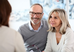 first-step-life-and-investment-planners-couple-smiling